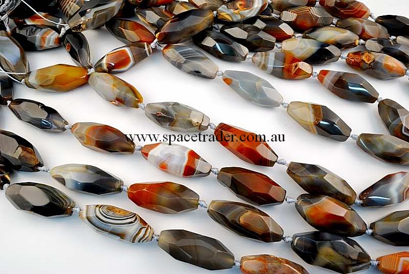 Agate - 16x38mm Faceted Long Rice New Botswana Agate in 9 Pcs a Strand