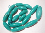 glass - graduated oval - 285 opaque green x 5 x 60cm strands