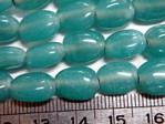 glass - 1535-285 - 12 x 8mm flat oval - teal green x 1 KG